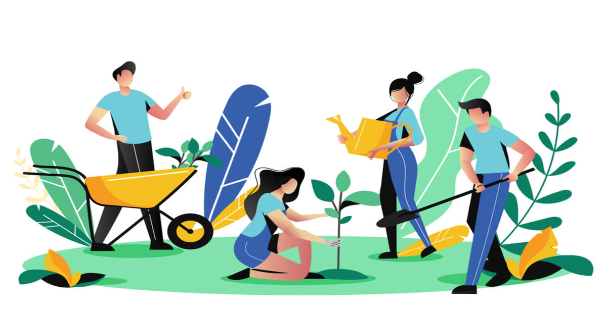 team of employees planting trees for a greener future
